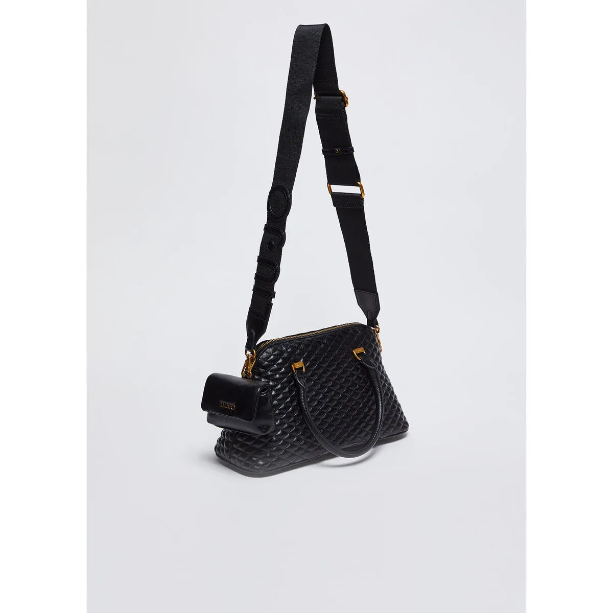 Bolso de mano brillante guateado