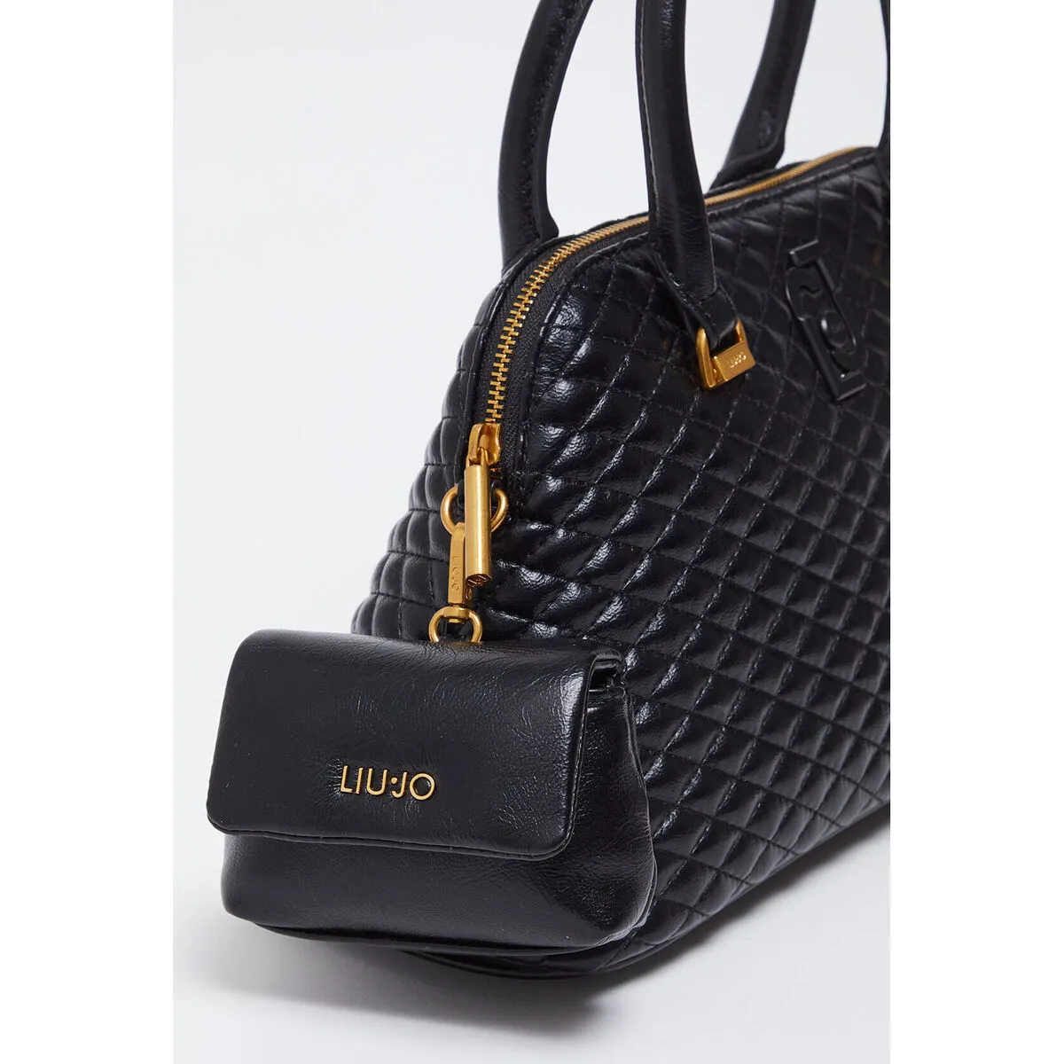Bolso de mano brillante guateado