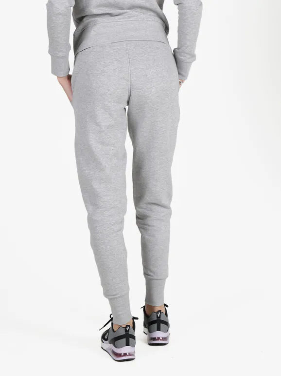 Kappa Pantalón deportivo de mujer con interior polar y puños.