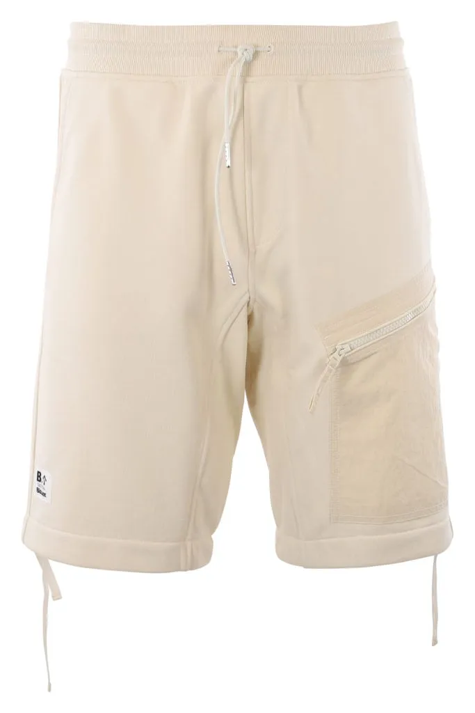 Pantalón corto de color natural con bolsillos