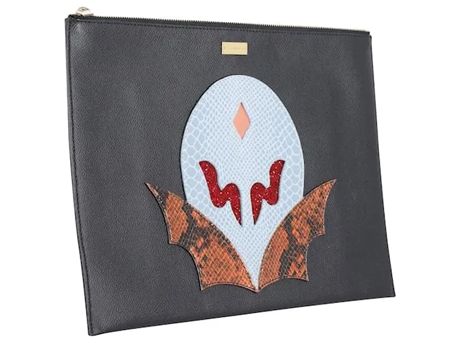 Stella Mc Cartney Cartera de mano con cremallera y aplicación Super Hero de Stella McCartney en piel sintética negra 